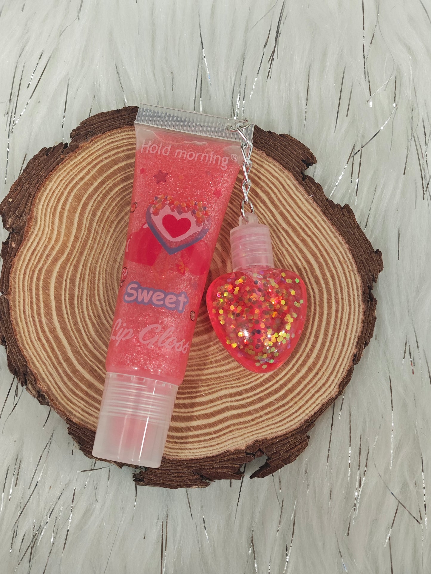 1 Lip Gloss Llavero de corazón 💫| ¡Tu brillo favorito siempre contigo!
